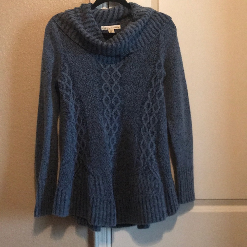 Turtle neck sweater.